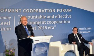 ECOSOC President Martin Sajdik  (at podium) and Wu Hongbo, USG for Economic and Social Affairs, attending Development Cooperation Forum High-level symposium in Berlin.