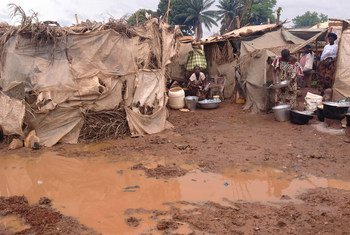 Water stagnates amidst tents and shelters following early-season rainfalls at the displacement site at Bangui's international airport in the Central African Republic.