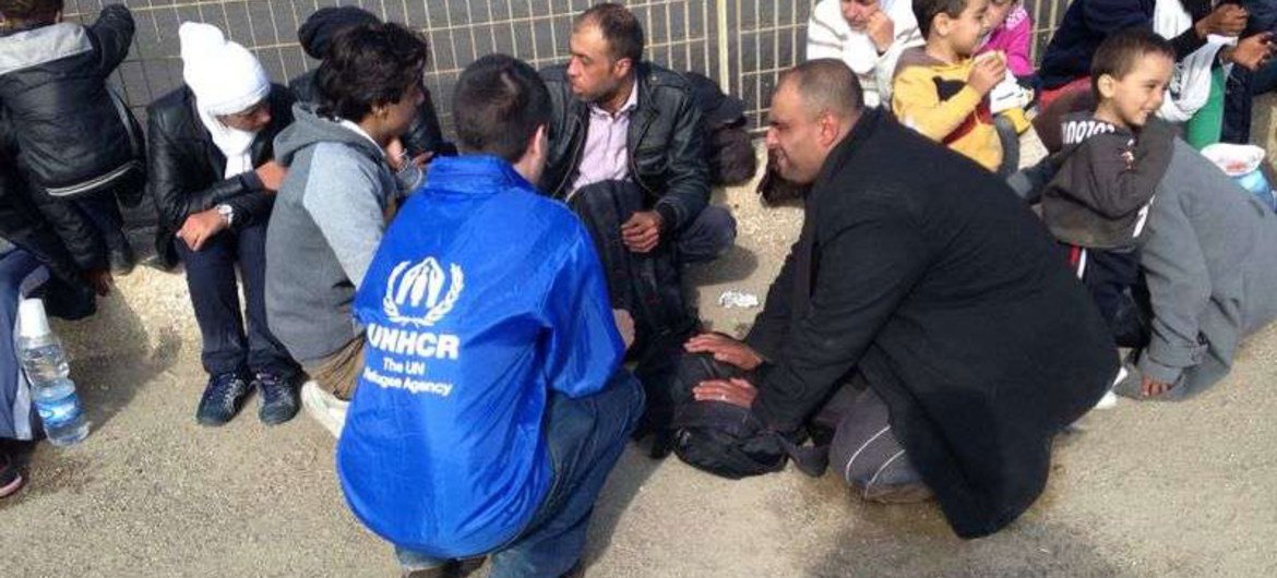 UNHCR staff talk with some of the growing number of people making the dangerous crossing of the Mediterranean to Italy.