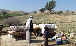 Displaced Palestinians with their belongings, following Israeli authorities demolition of their structures in Ein al Hilwa (Tubas Governorate) in the Jordan Valley on 30 January 2014.