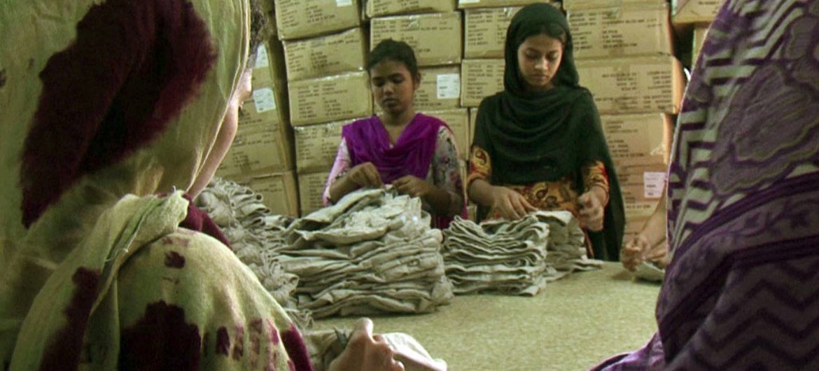 Garment workers at a factory in Bangladesh. Source: Screen capture from ILO video