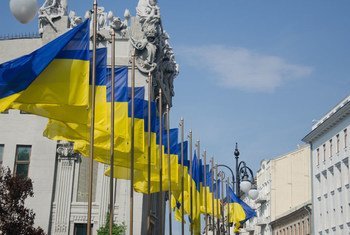 Ukrainian flags in front of the House with Chimaeras, Kyiv.