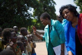 Valerie Amos, Under-Secretary-General for Humanitarian Affairs and Emergency Relief Coordinator, greets children at a returnees camp in Bossangoa in the Central African Republic (February 2014).