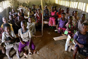 Children returned to their classroom in Kolula, South Kivu, Democratic Republic of the Congo, after armed conflict had forced the whole population to flee and hide in the forest for several weeks.