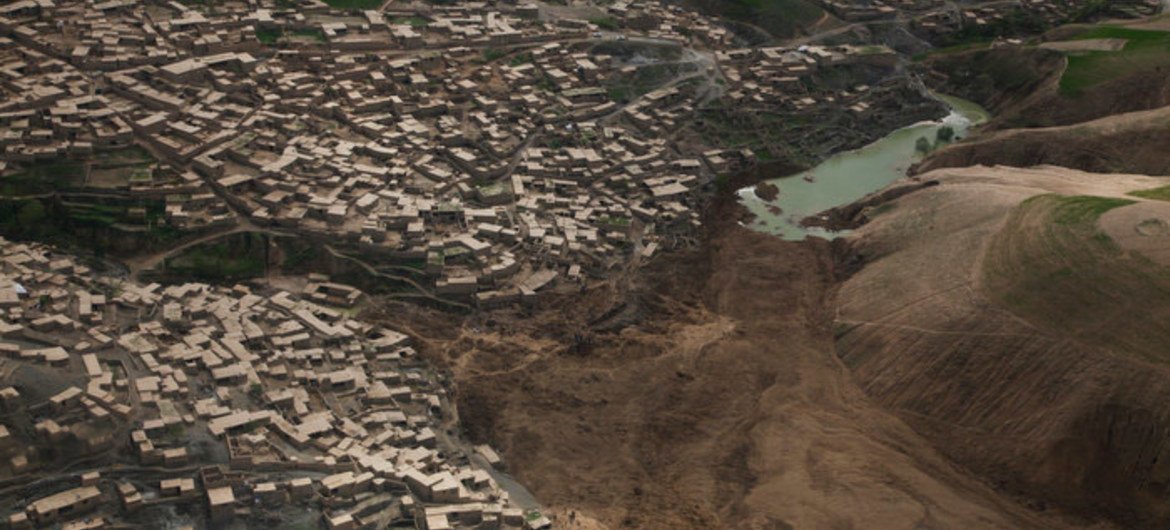 An aerial inspection of the Nowabad area of Abi-Barik village in the Argo district of Badakhshan province, Afghanistan, location of a deadly landslide which killed hundreds in early May 2014.