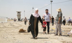 This family fled the fighting in Mosul, Iraq, and are close to the Khazair checkpoint. They hope to stay in Erbil city until it is safe to return home.