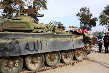 Children play on a tank in the remains of what used to be Muammar Gaddafi's Bab-al-Azzizeya compound in Libya's capital, Tripoli (November 2011).
