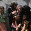 Плестинские дети в Газе оплакивают погибших ( июль 2014г.) Фото из архива ЮНИСЕФ/Эль-Баба