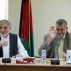 Special Representative for Afghanistan and head of UNAMA, Ján Kubiš (right), with Chairman Ahmad Yusuf Nuristani of the IEC Board of Commissioners following a meeting of the IEC.