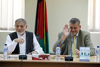 Special Representative for Afghanistan and head of UNAMA, Ján Kubiš (right), with Chairman Ahmad Yusuf Nuristani of the IEC Board of Commissioners following a meeting of the IEC.