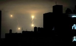 Israeli forces' flares light up the night sky of Gaza City on early Tuesday, July 29, 2014.