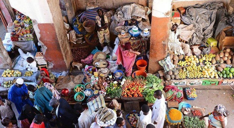 Vendors selling vegetables and fruits at the central market in  N’Djamena, Chad.