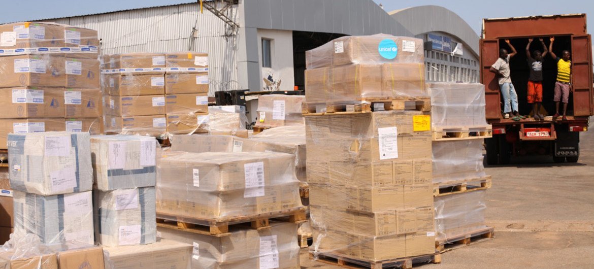 Ebola response: medical supplies, including protective equipment and essential medicine, are loaded onto trucks at the Lungi International Airport in Freetown, capital of Sierra Leone.