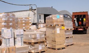 Ebola response: medical supplies, including protective equipment and essential medicine, are loaded onto trucks at the Lungi International Airport in Freetown, capital of Sierra Leone.