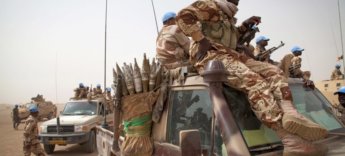 UN peacekeepers from Chad patrol the area outside their base in Tessalit, northern Mali.