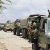 Troops of the Somali National Army and the African Union Mission in Somalia, line up in a convoy on the road leading up to the Al-Shabaab stronghold of Barawe.