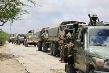 Troops of the Somali National Army and the African Union Mission in Somalia, line up in a convoy on the road leading up to the Al-Shabaab stronghold of Barawe.