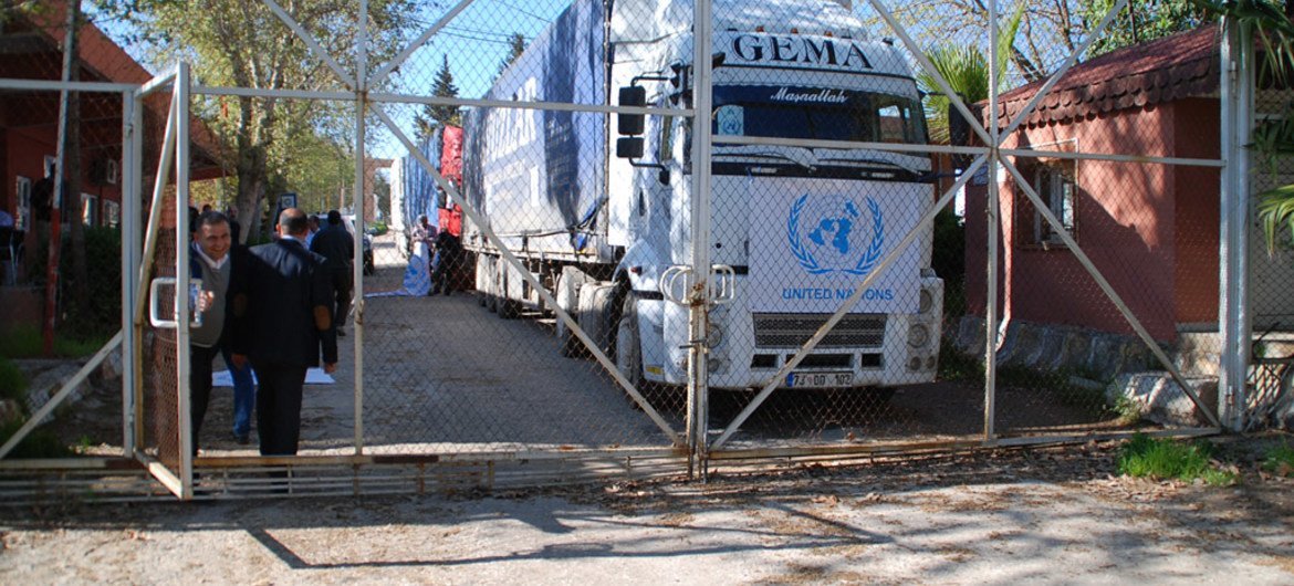 A UN truck with humanitarian supplies at the Turkish side of the border awaiting green light to cross to the Syrian side, in March 2014.