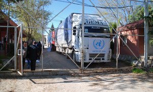 A UN truck with humanitarian supplies at the Turkish side of the border awaiting green light to cross to the Syrian side, in March 2014.