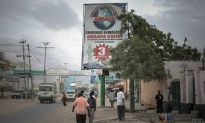 Billboards displaying a variety of advertisements along a street in Mogadishu, capital of the Horn of Africa nation Somalia.