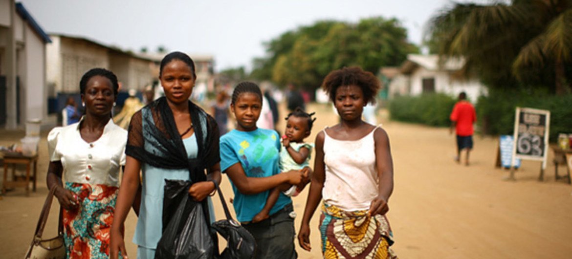 Ruth Dureng (second left, with friends in Monrovia, Liberia) was abused at home and had to leave after refusing a forced marriage.