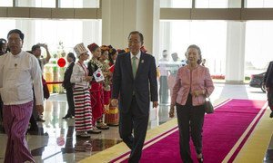 Secretary-General Ban Ki-moon and his wife Yoo Soon-taek arrive for the opening of the 6th Annual ASEAN-UN Summit in Nay Pyi Taw, Myanmar.