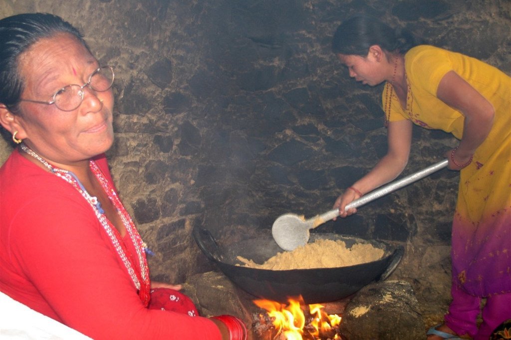 In many parts of rural Nepal, women spend on average of five hours a day in smoke-filled kitchens such as these, underming their health.