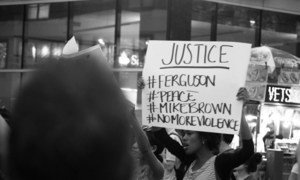 Protestors gather in New York City to demonstrate against the police shooting of Michael Brown (August 2014).