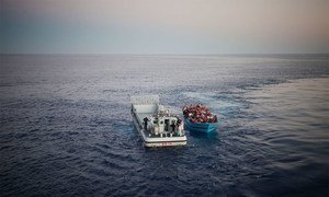 Risking their lives to reach Europe from North Africa, a boatload of people, some of them likely in need of international protection, are rescued in the Mediterranean Sea by the Italian Navy.