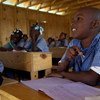 Students inside a newly built classroom at a camp for internally displaced persons in Port-au-Prince, Haiti.