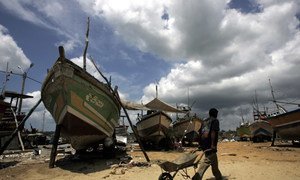 A fishing trawler damaged by the December 2004 tsunami under repairs at the Kudewella boat repair centre in Sri Lanka with assistance from FAO.
