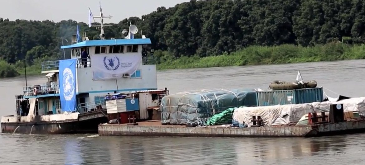 A WFP barge transporting food supplies on the Nile River.