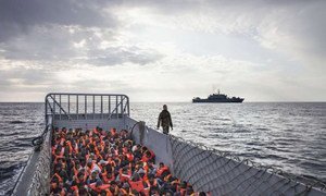 This Italian Navy landing craft is carrying 186 people who have been rescued at sea.
