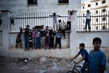 Boys play on the streets of Aleppo, capital of the north-western Aleppo Governorate, Syria.