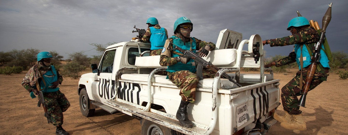 UNAMID troops from Tanzania, deployed in Khor Abeche, South Darfur, conduct a routine patrol in Karbab village.  