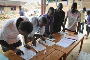 Voters' lists being checked for the upcoming elections in Burundi.