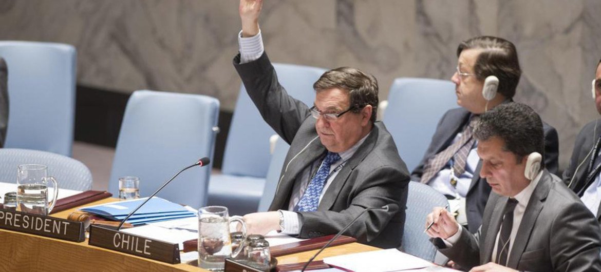Amb. Cristián Barros Melet of Chile, President of the Security Council for January, voting as the Council unanimously renewed sanctions on the Democratic Republic of the Congo (DRC).