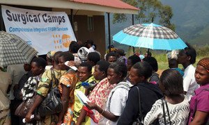 Women line up at the Kanungu Health Centre IV in Uganda to receive HIV and cervical cancer counselling and testing.