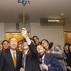 Secretary-General Ban Ki-moon tours reopened visitors' lobby in General Assembly Building. He is seen here posing for a 'selfie' with Brazilian visitors. February 2015 United Nations, New York.