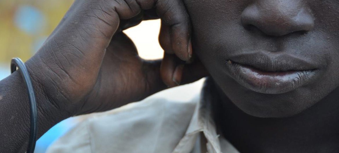 Cet enfant soldat, démobilisé au Soudan du Sud en 2015, n'est jamais allé à l'école. Photo UNICEF/Doune Porter