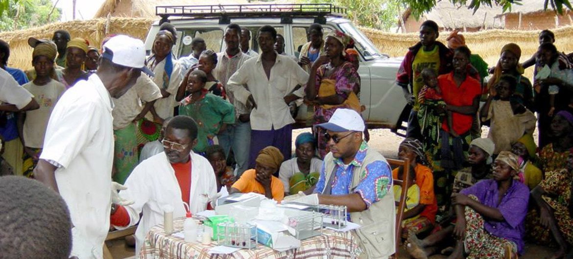 A mobile team of national health care workers performing systematic screening of population for human sleeping sickness in Bodo village, Chad.