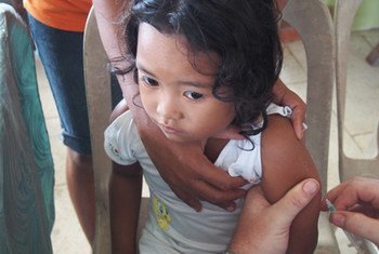 A girl being vaccinated against measles. Photo: UNICEF/Heather Papowitz