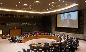 A wide view of the Security Council Chamber as Special Representative Bernardino Léon (shown on screen), briefs the Security Council via video conference on the situation in Libya.