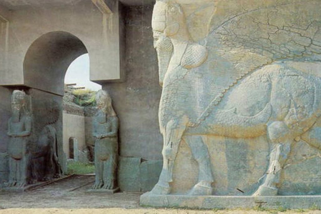 A statue of a lamassu, an Assyrian protective deity, at the North West Palace of Ashurnasirpal in Nimrud, Iraq.