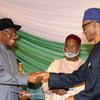 President Goodluck Jonathan (left) and Gen. Muhammadu Buhari, the two main presidential candidates in the 28 March 2015 elections in Nigeria at the signing of the “Renewal of Pledges” ceremony. Chairman of the Peace Committee, former head of State Gen. Ab