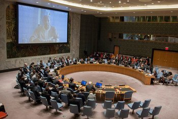 A wide view of the Security Council Chamber as Special Representative Mohammed Ibn Chambas (on screen), addresses the meeting on threats to international peace and security caused by the extremist group Boko Haram.