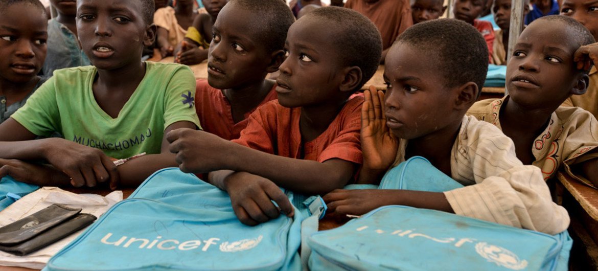 Children attend a UNICEF-provided tent classroom, in the Gire 2 camp for internally displaced people, near Yola, the capital of Adamawa, Nigeria.