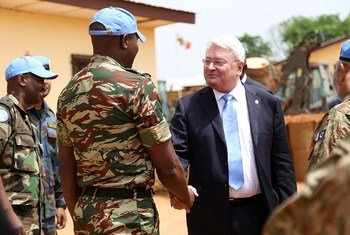 Hervé Ladsous, Under-Secretary-General for Peacekeeping Operations, greeting UN peacekeepers during a visit to the Central African Republic (CAR).