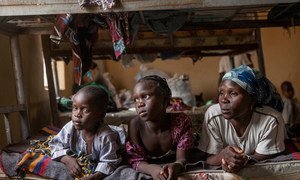 A woman and her children in a camp for internally displaced persons, in Yola, the capital of Adamawa, Nigeria, after members of the Boko Haram rebel group attacked their home.