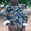 Этому мальчику-солдату нет еще и пяти лет.Фото ЮНИСЕФ